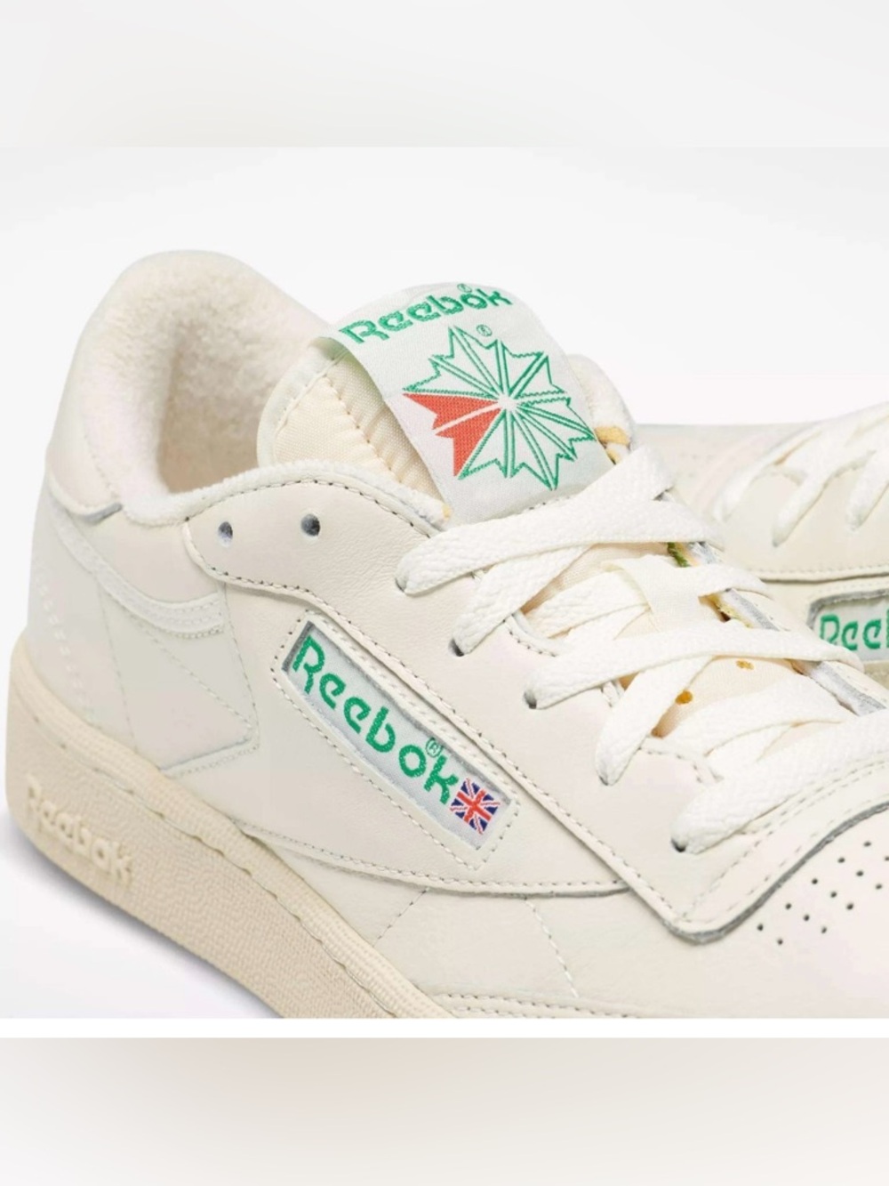 Reebok Off-White Leather Sneaker with Green and Red Accents